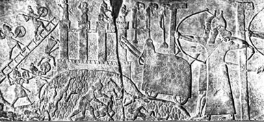 Ассирийский царь Тиглатпасалар III осаждает неприятельский город. 
